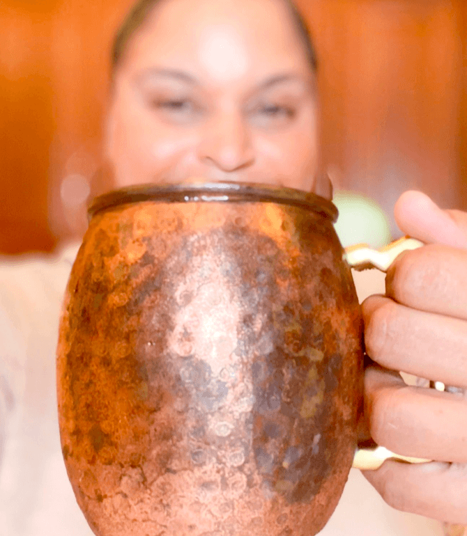 Meryl-holding-Apple-Cider-Moscow-Mule